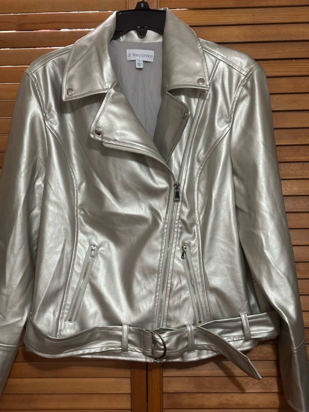 Stacy London" Faux Leather Metallic Moto Jacket in silver.